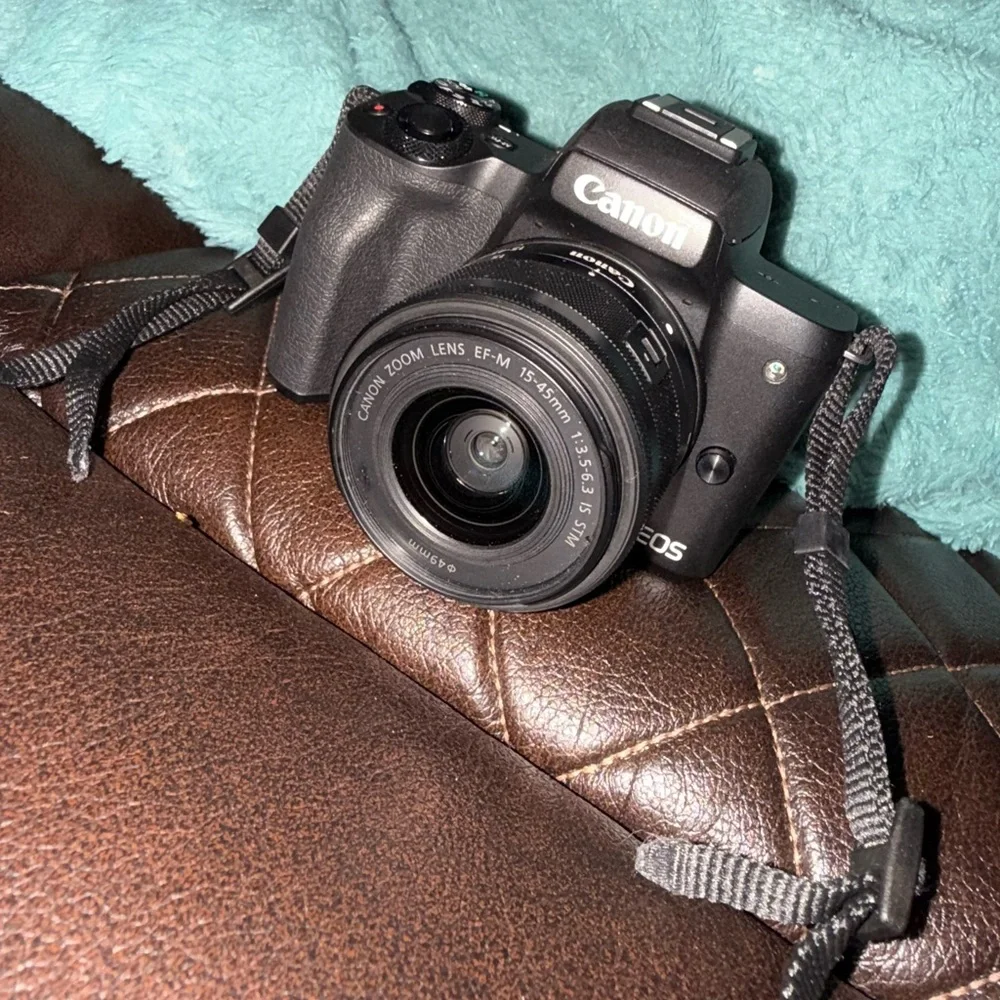 Canon Black DSLR Camera with Strap